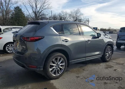 2021 Mazda Cx-5 Grand Touring Reserve z USA, uszkodzony, nr VIN JM3KFBAY9M0419324